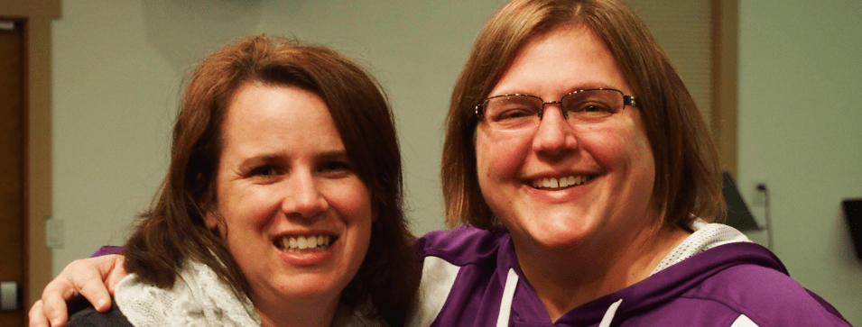 sin two ladies smiling